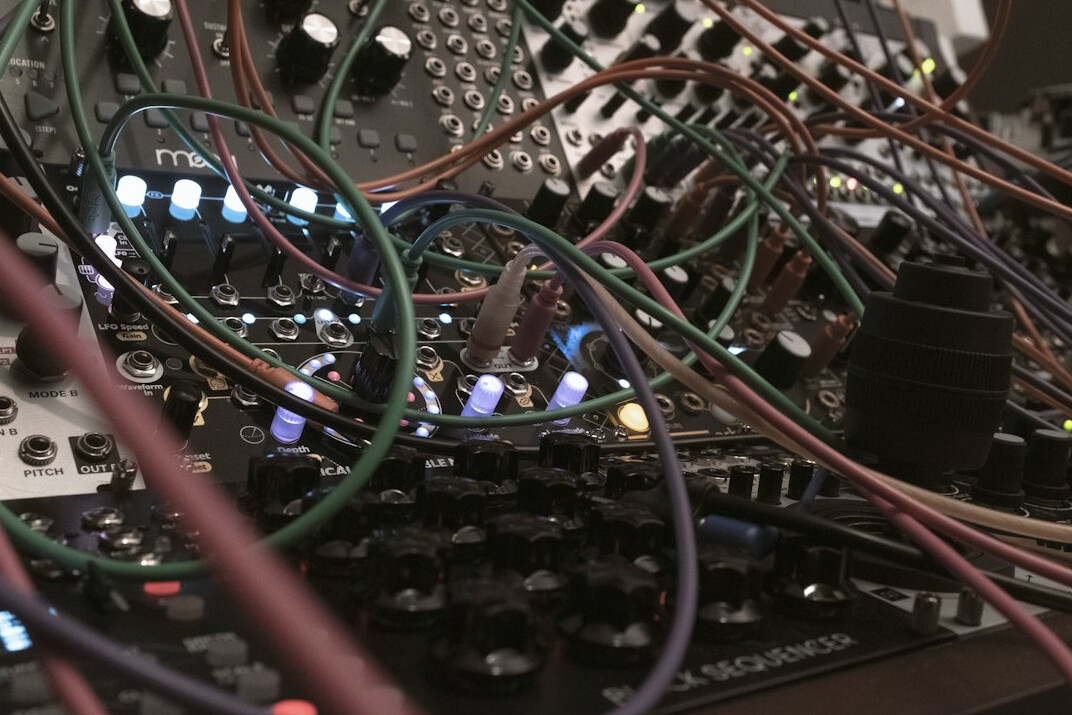 Professional broadcast video mixing and routing equipment rack with cables